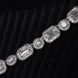 EMERALD CLUSTERED TENNIS CHAIN - SILVER PLATED