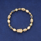 6MM BLUE GEMSTONE BRACELET – GOLD PLATED