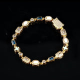 6MM BLUE GEMSTONE BRACELET – GOLD PLATED